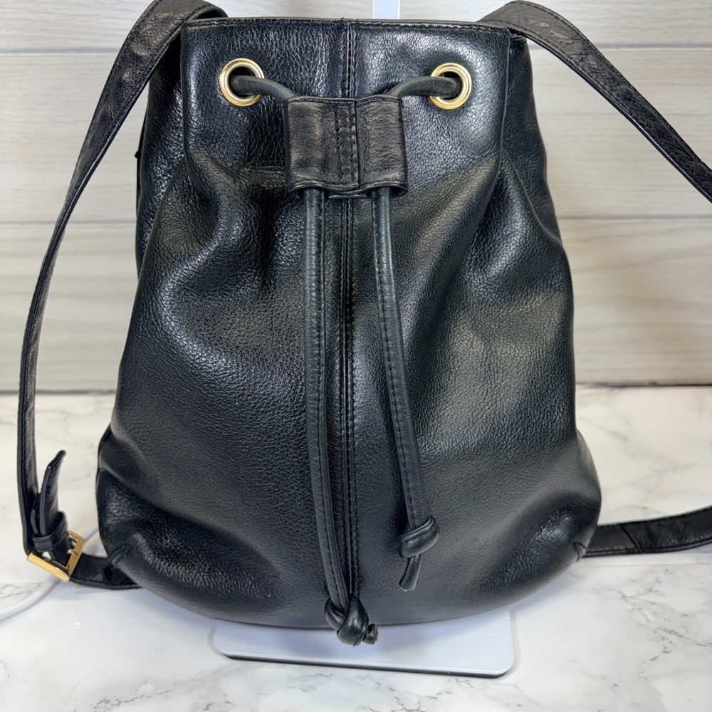 Black leather bucket bag with gold hardware